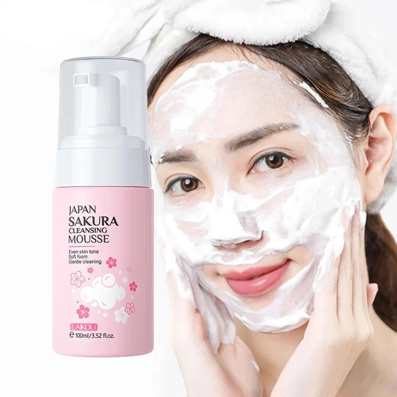 Woman applying cleansing mousse with LAIKOU product on the left